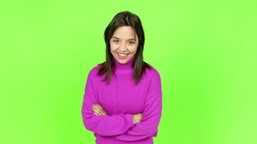 Young brunette woman keeping the arms crossed in confident expression over isolated background. Green screen chroma key - Powered by Shutterstock - Get 15% off with code: PIKWIZARD15