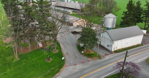 Farm building access closed. Quarantine for avian flu. Deadly chicken poultry bird respiratory disease theme. Aerial view.