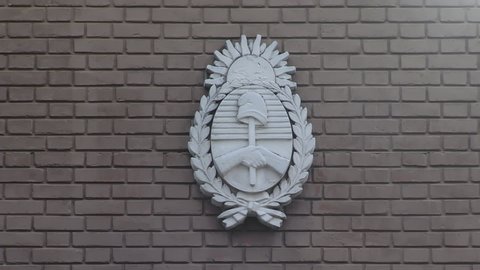 Coat of Arms of Argentina or Argentine Republic Stone Shield on a Brick Wall on the Main Door in a Public School in Buenos Aires. Close Up. Zoom In. 