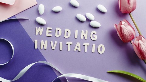 Wedding invitation letter text on purple background
