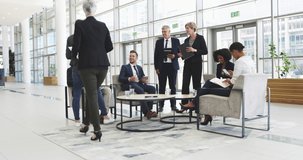 The more people you connect with, the better your chances are. 4k video footage of a businesswoman shaking hands with her colleagues during a meeting in a modern office.