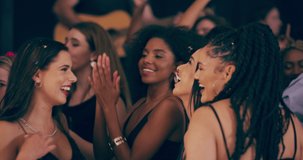 The party is thriving when everyones vibing. 4k video footage of young women dancing together at a party.
