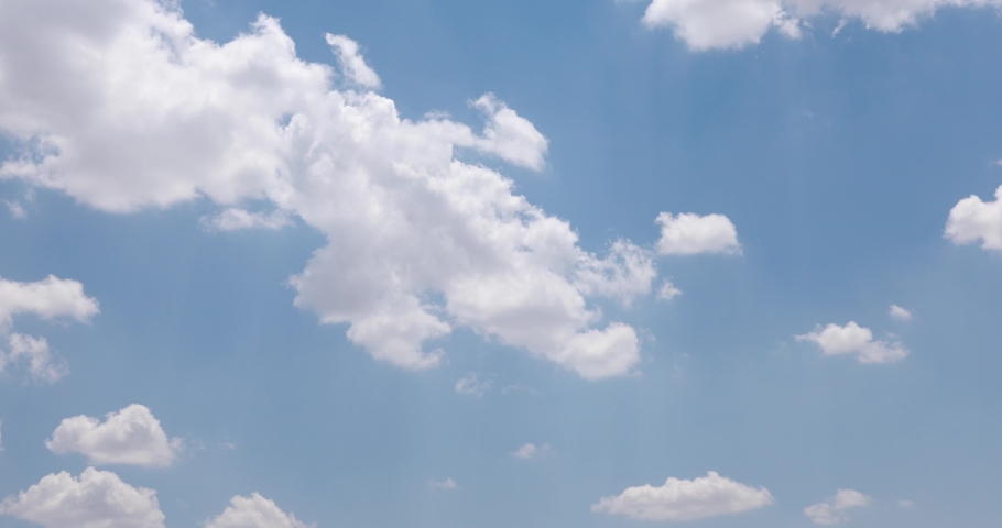 Beautiful clouds over cities View of Blue sky with clouds clouds puffy cumulus cloud relaxation weather Summer time clean and sunny atmosphere background Aerials Slow motion  | Shutterstock HD Video #1089784081