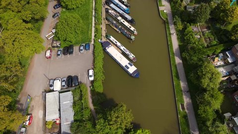 Aerial images over the canal that crosses the city of Devizes, Wiltshire, UK revealing the beauty and structure built to house the boats that crossed the country for hundreds of years.