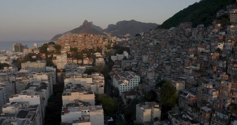 Aerial View of Ipanema Buildings and Favelas with Two Brothers' Mountain background in Sunrise light. May 2020. Rio de Janeiro - Brazil.
