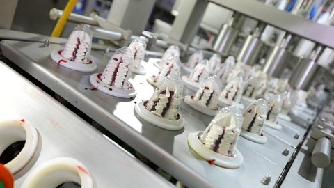 Automated production of ice cream. Automated ice cream production line. Ice cream production.