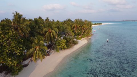 Aerial drone view of a beautiful resort island in the Maldives, Ari Atoll Sun island 4K