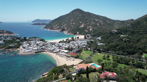 Shek O, a coastal town of Hong Kong near Stanley and Repluse Bay,is a fishing villages, beautiful scenery, Golf club, hiking trails, beaches and islands, geological formations, sea bay, pier and boats