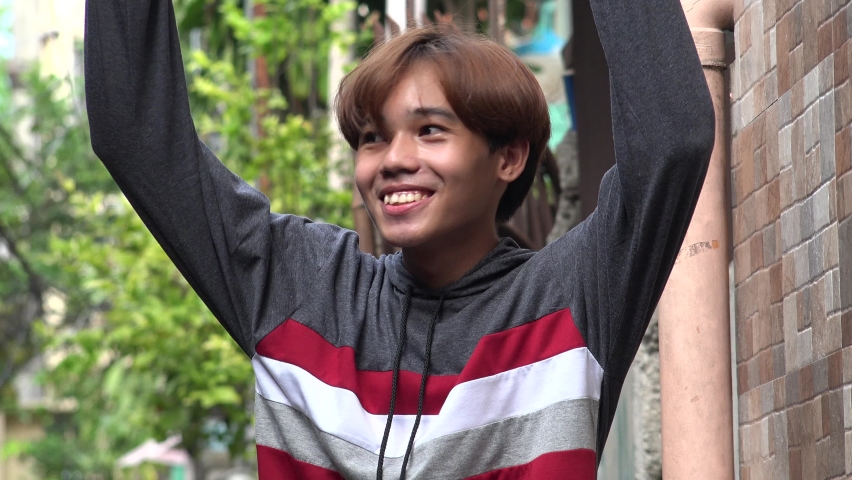 An Excited Proud Male Asian Man