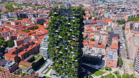 Aerial view of ecological skyscrapers with many trees on each balcony. Bosco Verticale. Modern architecture, vertical gardens, terraces with plants. Ecology. Green Planet. Milan. Italy, mai 2022 - Powered by Shutterstock - Get 15% off with code: PIKWIZARD15