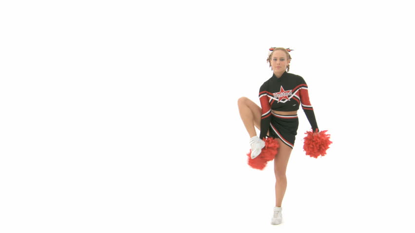 Cheerleader raises her right leg over her head and holds it