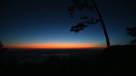 Beautiful sunrise with endless horizon on  Phukradueang national park loei city thailand.Phu Kradueng National Park is one of the best known national parks of Thailand.Timelapse vdo
