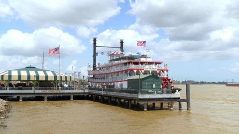 New Orleans , LA , United States - 04 21 2022: The City of New Orleans Riverboat docked on the Mississippi River in New Orleans