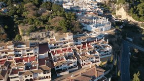 Aerial 4K video from drone to Benalmadena. In the background large mountains and the sea.Malaga, Andalusia, Spain, Europe.