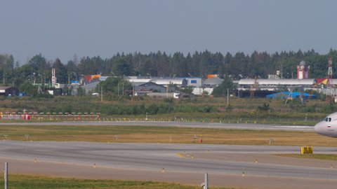MOSCOW, RUSSIAN FEDERATION - JULY 31, 2021: Passenger plane Airbus A320 of Aeroflot taxis to the terminal after landing at Sheremetyevo Airport on a summer day.