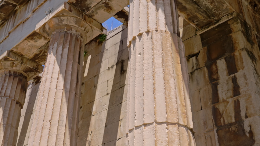 Moving a long a colonnade from the  ancient Temple of Hephaestus in Ancient Agora, Athens, Greece Royalty-Free Stock Footage #1089815661