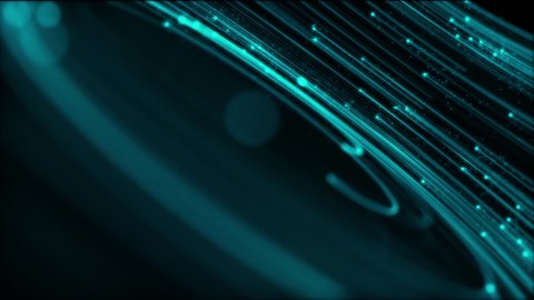 Digital data flow motion background animation with a fast moving stream of green blue fiber optic light data nodes and particles. This modern technology background is full HD and a seamless loop.