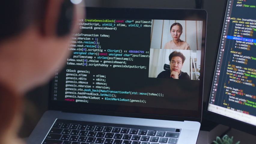 Asian woman developer programmer, software engineer, IT technical support center talking with team via video call. Working on computer overtime to check coding in bugging system.  - Powered by Shutterstock - Get 15% off with code: PIKWIZARD15