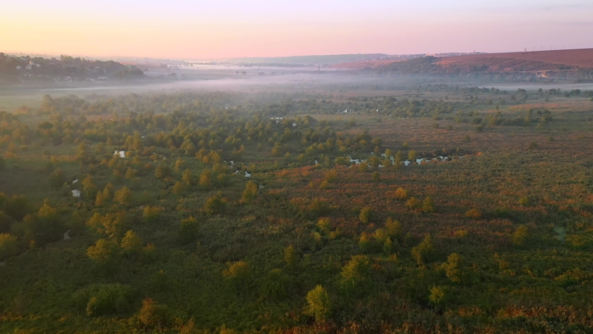Splendid scenery of untouched nature and swampy area, shooting from a drone. Location place Ukraine, Europe. Footage from a bird