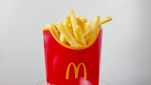 Pruszcz Gdanski, Poland - April 28, 2022: Rotate McDonald's french fries. McDonald's is an American multinational fast food corporation.