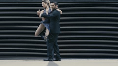 Argentine couple dancing Tango in the streets of Buenos Aires Argentina