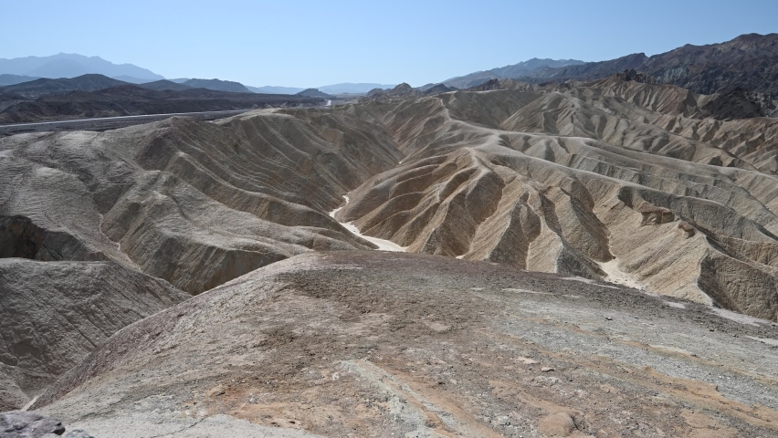 Zabriskie point at Death Valley in California on a windy day. 