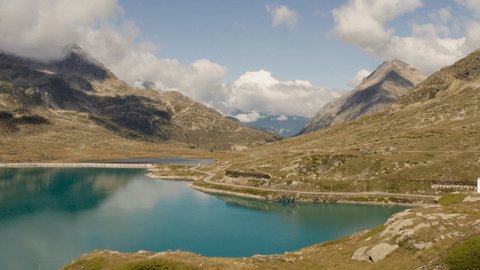 Drone aerial view of stunning mountain lakes view in Switzerland. Drone flying above pristine landscape in the Alps 