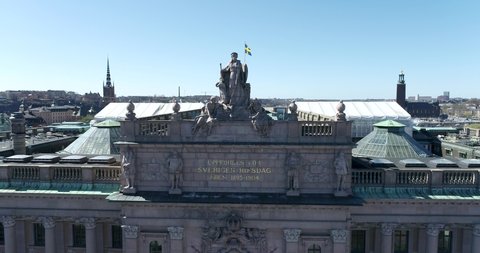 Stockholm, Sweden - April 22, 2022: Roof of Parliament House Riksdagshuset in Stockholm, Sweden. Riksdag - Building of the Swedish Parliament. 4k Drone