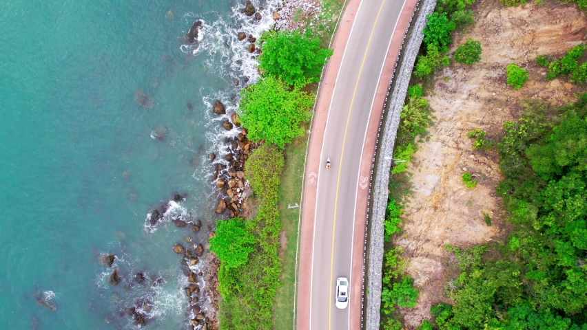 Aerial view top view of Beautiful beach road trip. Vertical | Shutterstock HD Video #1089845289