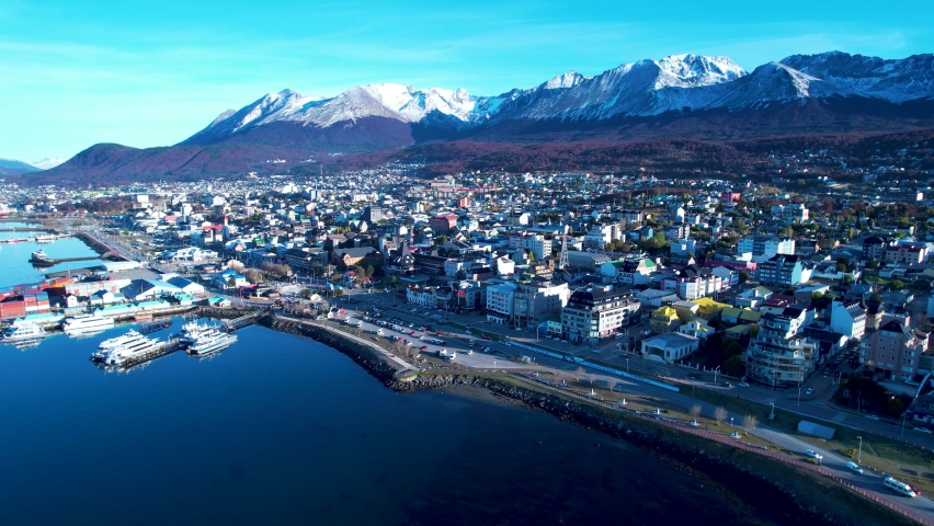 Cityscape of town of Ushuaia at Tierra del Fuego, Argentina. Natural landscape of scenic town between mountains. Ushuaia Argentina. Patagonia Argentina at Ushuaia, Tierra del Fuego, Argentina. Royalty-Free Stock Footage #1089845431
