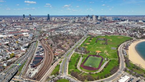 Boston Downtown Financial District and Back Bay skyline aerial view in spring from South Boston next to Joe Moakley Park, Massachusetts MA, USA. 