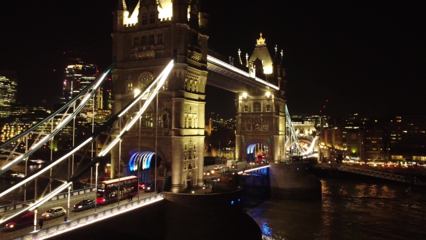Tower Bridge during a busy night, at the end we will find the beauty of The Shard 
