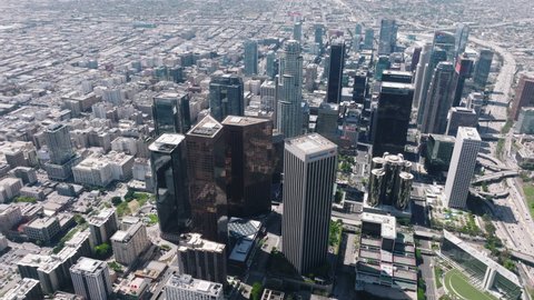 Los Angeles USA Apr 2022. Aerial drone footage of Hollywood Downtown skyscrapers on cinematic urban city background. Financial and residential buildings cityscape view on sunny summer day, 4K footage