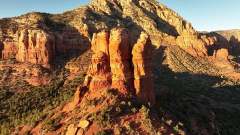 This aerial video highlights one of Sedona’s most iconic Red Rock formations, Chimney Rock also known as “three fingers.” Chimney Rock is a popular hiking and walking trail that offers stunning views.