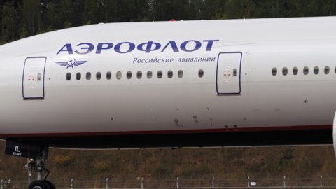 MOSCOW, RUSSIAN FEDERATION - JULY 29, 2021: Side view medium shot Boeing 777 of Aeroflot braking after landing at Sheremetyevo airport