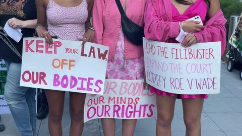 Demonstrators protest outside of the U.S. Courthouse in response to leaked draft of the Supreme Court's opinion to overturn Roe v. Wade, in Los Angeles, Tuesday, March 3, 2022.