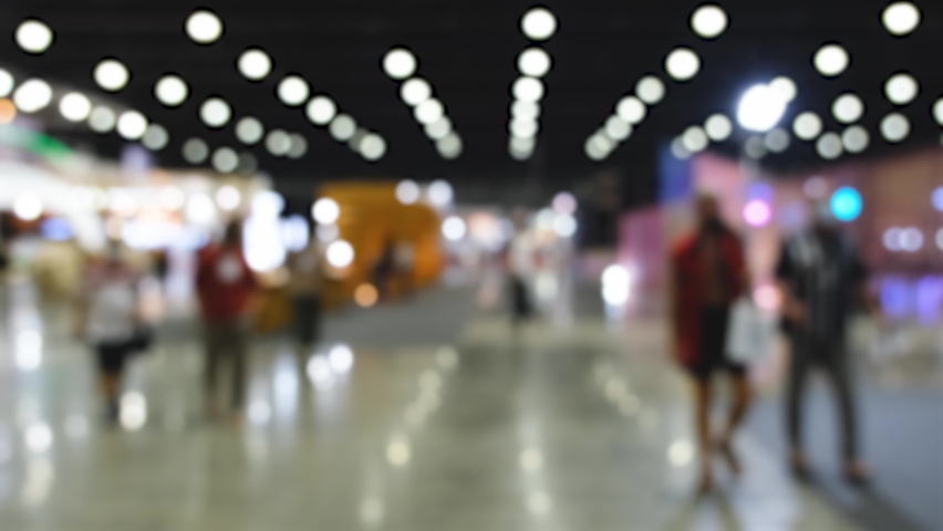 Abstract background blurred many people in the exhibition expo event or trade fair
