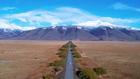 Patagonia Argentina. Famous road at town of El Calafate at Patagonia Argentina. Patagonia road landscape. Amazing landscape of desert scenery with nevada mountain. El Calafate at Patagonia Argentina.