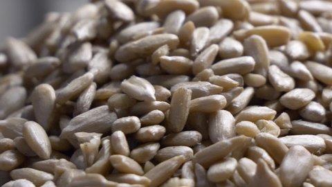 Sunflower seeds without shell, full hd video. Highly detailed macro video with sunflower seeds, rotation.