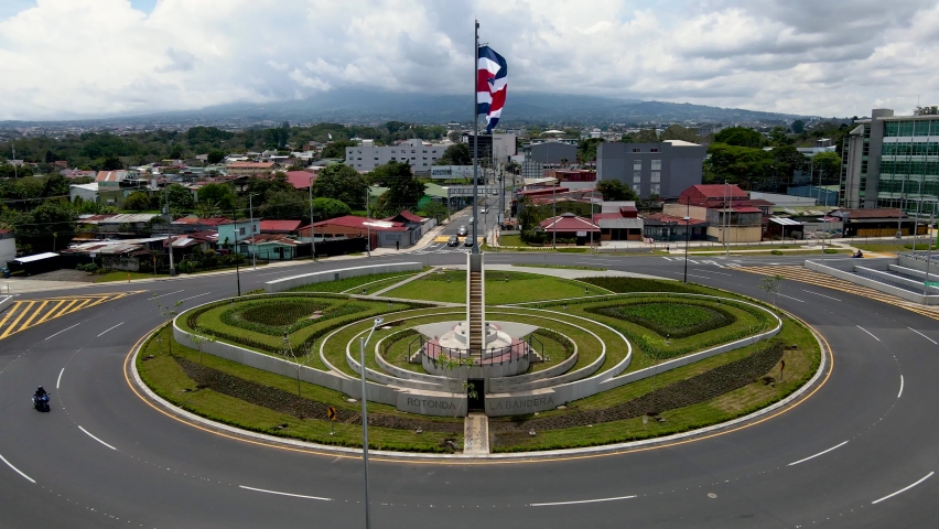 Beautiful cinematic aerial footage of the new Flag roundabout in Costa Rica, Rotonda de la bandera, un San José Royalty-Free Stock Footage #1089883735