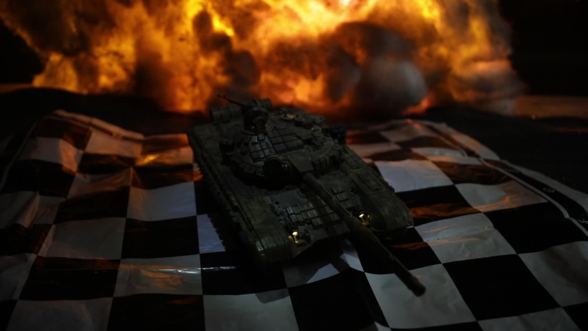 War between Russia and Ukraine, conceptual image of war using chess board and tank on a dark background of explosion. Ukrainian and Russian crisis, political conflict. Selective focus | Shutterstock HD Video #1089894867