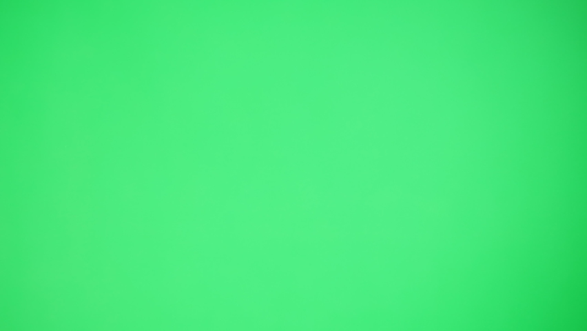 Abstract smoke on green chroma key background. Smoking, steam clouds close-up. Royalty-Free Stock Footage #1089895737