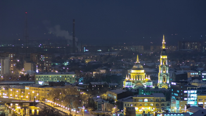 The Annunciation Cathedral winter night timelapse. It is one of the tallest Orthodox churches, its gate decorated with golden onion dome and icons, Kharkov, Ukraine.