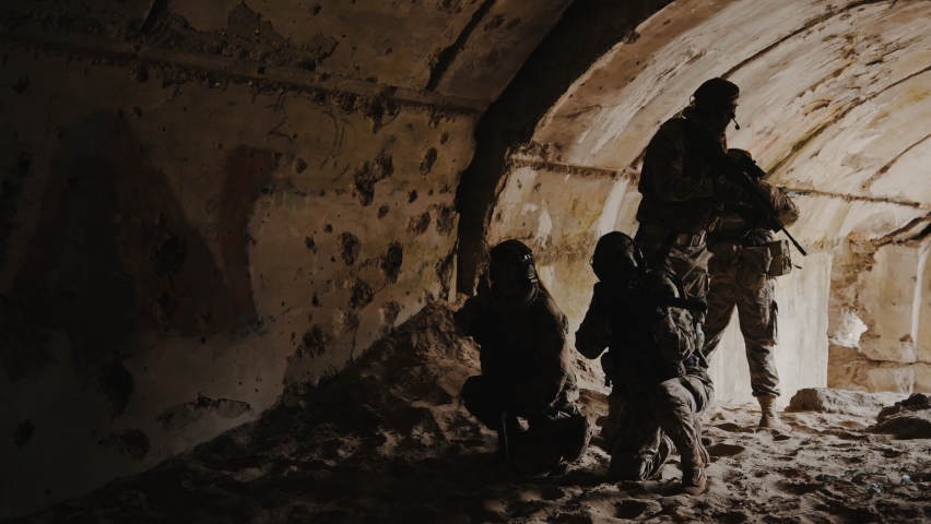 Built up tunnel channel having sneaky squad of commandos. High quality 4k footage