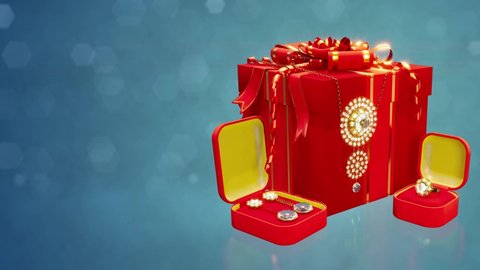 red boxes with golden ring, earrings and collar with diamonds