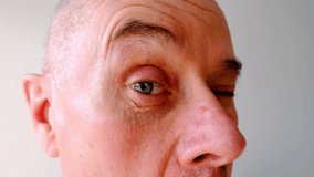 close-up face of charismatic mature man 60 years old contorts mimic muscles, goggles eyes, screaming mouth wide open, threatening facial expressions tooth enamel is heavily worn - Powered by Shutterstock - Get 15% off with code: PIKWIZARD15