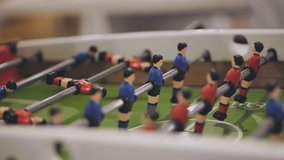 Players play table football in the clubhouse. - Powered by Shutterstock - Get 15% off with code: PIKWIZARD15