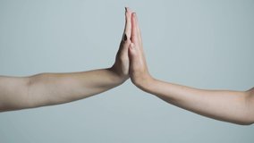 Man and girl giving high five. Two hands, male and female. High-five gesture and tenderness of friendship between man and woman. High five concept for success, teamwork, congratulating, celebration - Powered by Shutterstock - Get 15% off with code: PIKWIZARD15