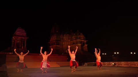 KHAJURAHO, INDIA 25 FEBRUARY 2022 : Dancers perform classical dance during Khajuraho Dance Festival it was open for public without entry fee, It is annual festival in India.