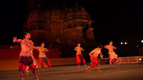 KHAJURAHO, INDIA 25 FEBRUARY 2022 : Dancers perform classical dance during Khajuraho Dance Festival it was open for public without entry fee, It is annual festival in India.